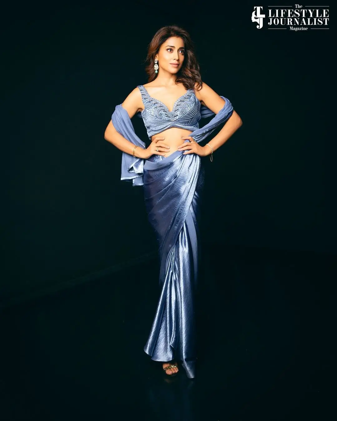 SHRIYA SARAN STILLS IN BLUE SAREE SLEEVELESS BLOUSE 2